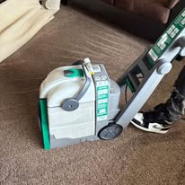 Carpet cleaning equipment at work